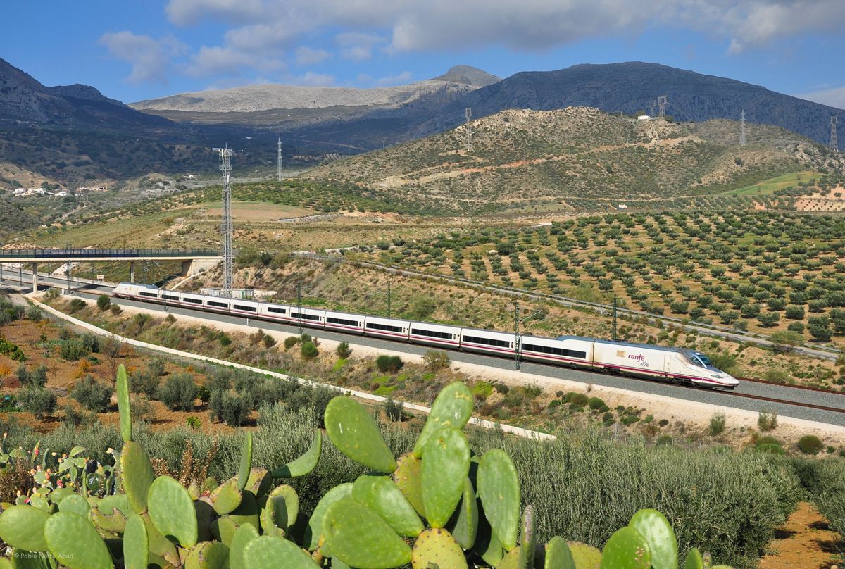 A Renfe AVE high-speed train on a Spanish railway line